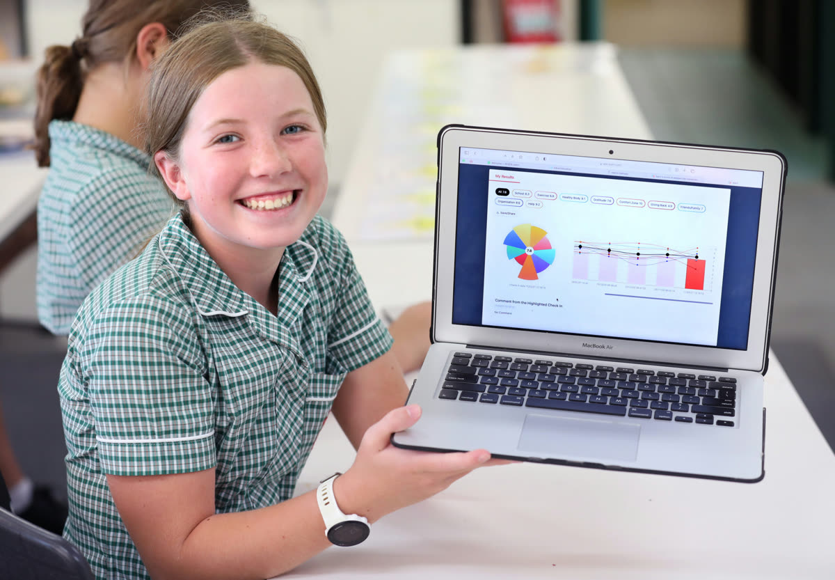 A student checking in on iyarn on their school laptop